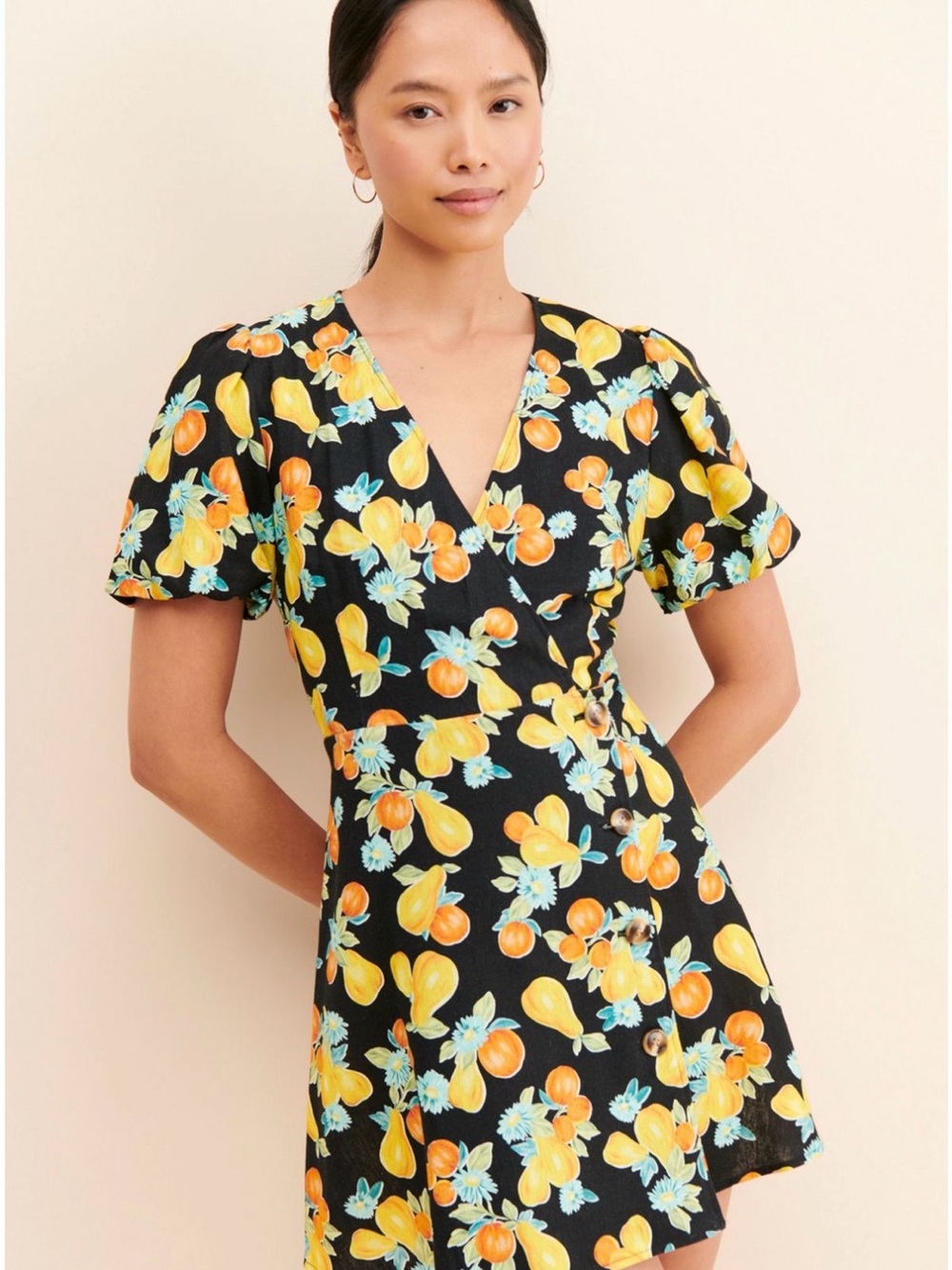 Anthropologie Black Wrap Mini Dress with Yellow & Orange Fruit Print